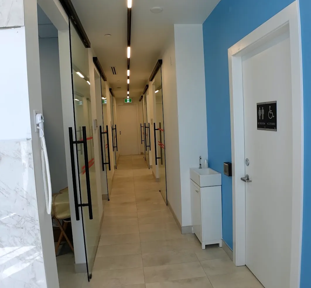 Treatment room corridor inside the Brighter Smile clinic on Marine Drive
